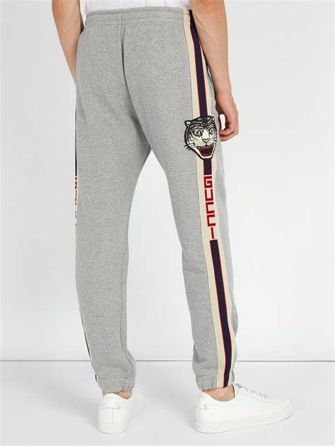 gucci tiger track pants|gucci side stripe track pants.